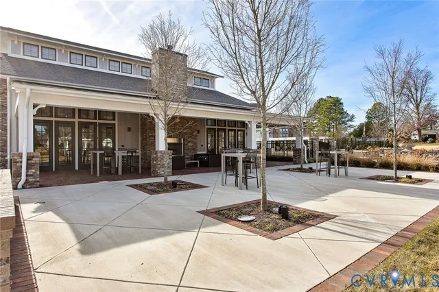 a outdoor space with lots of white furniture