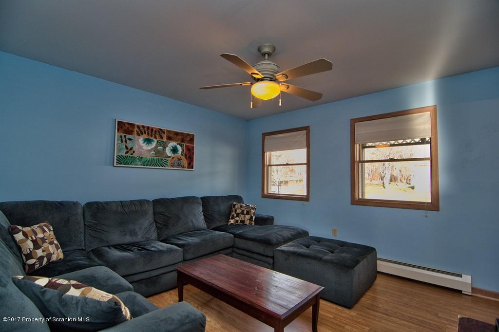 132 Thomas Road Moscow, PA 18444 - Photo 14 of 46 a living room with furniture and a window
