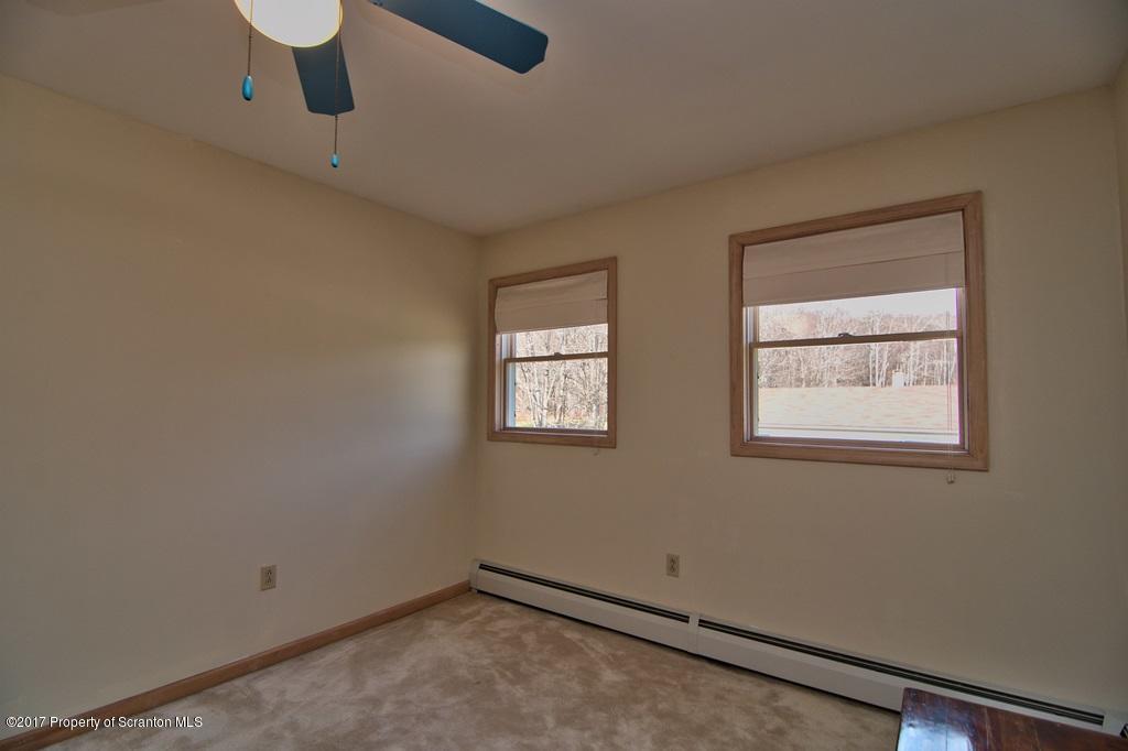 132 Thomas Road Moscow, PA 18444 - Photo 19 of 46 an empty room with windows