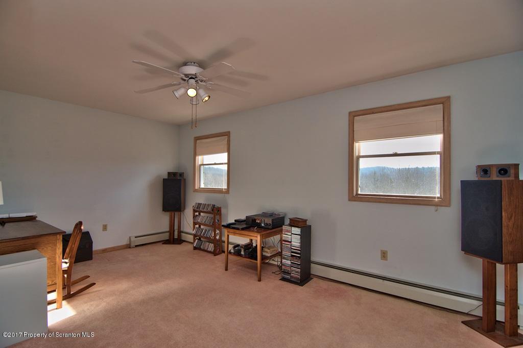 132 Thomas Road Moscow, PA 18444 - Photo 22 of 46 a view of a livingroom with furniture and a window