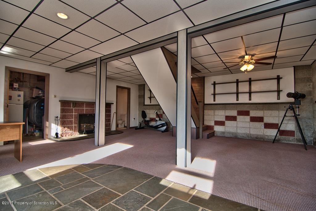 132 Thomas Road Moscow, PA 18444 - Photo 31 of 46 a view of a big room with lots of furniture and a rug
