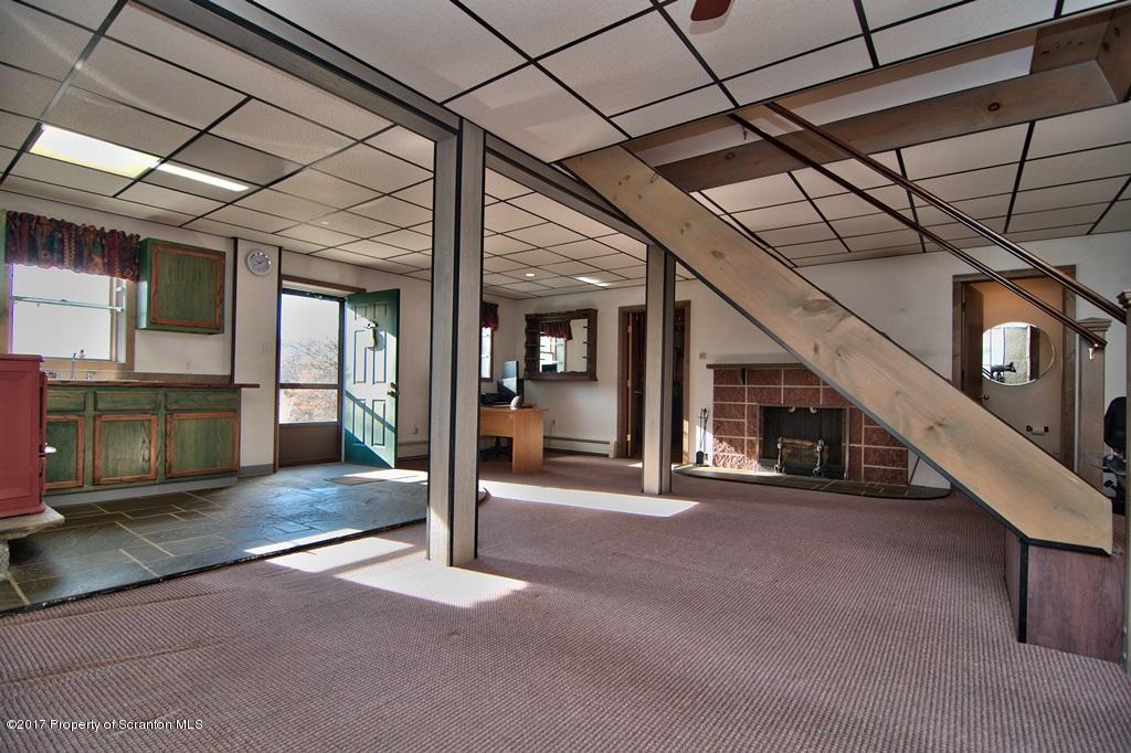 132 Thomas Road Moscow, PA 18444 - Photo 32 of 46 a view of a hall with wooden floor