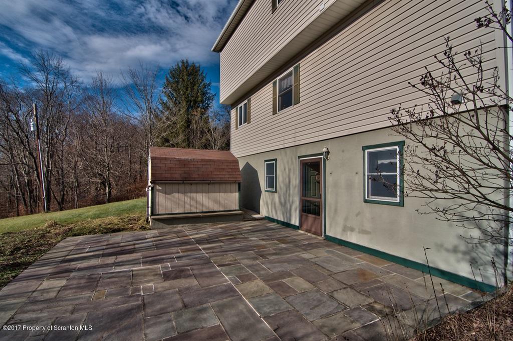 132 Thomas Road Moscow, PA 18444 - Photo 43 of 46 a view of a house with a yard