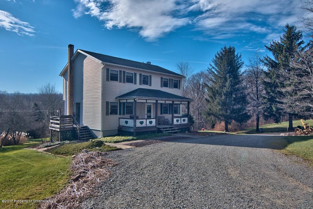 132 Thomas Road Moscow, PA 18444 - Photo 44 of 46 a front view of a house with a yard