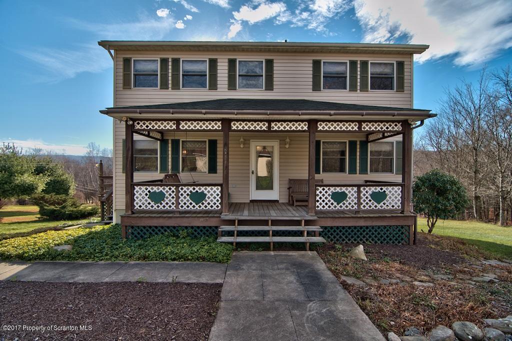 132 Thomas Road Moscow, PA 18444 - Photo 45 of 46 a front view of a house with garden