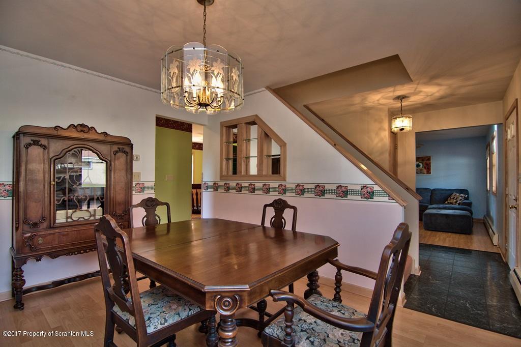 132 Thomas Road Moscow, PA 18444 - Photo 9 of 46 a view of a dining room with furniture and wooden floor