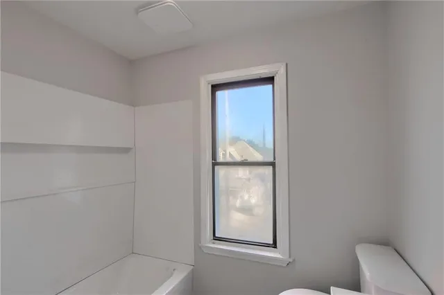 a bathroom with a toilet