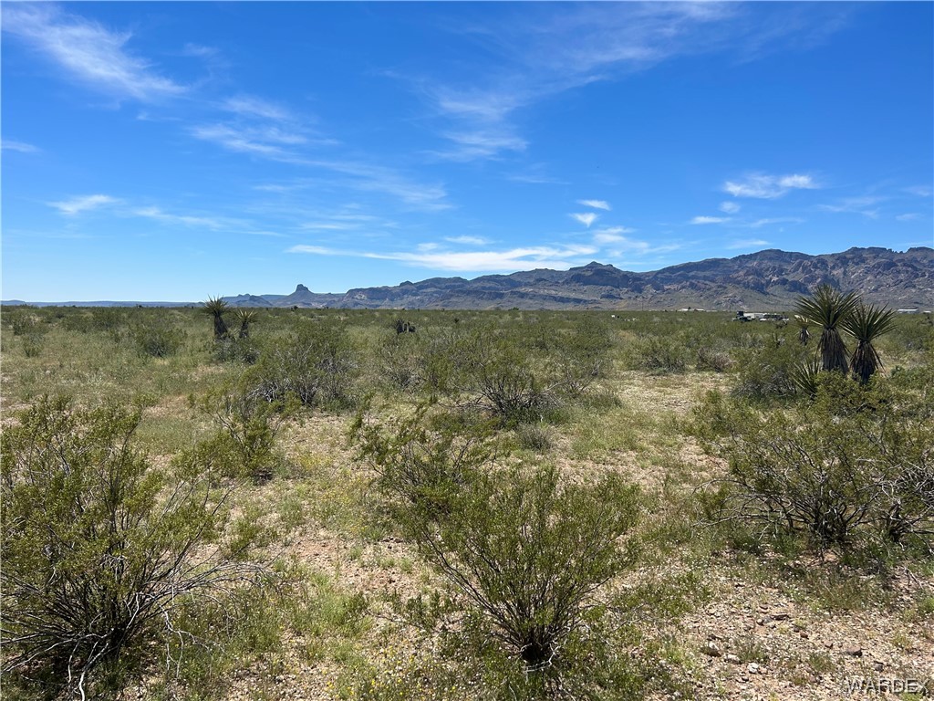 3321 South Alexandrite Road Golden Valley, AZ 86413 - Photo 1 of 7 a view of an lake and mountain
