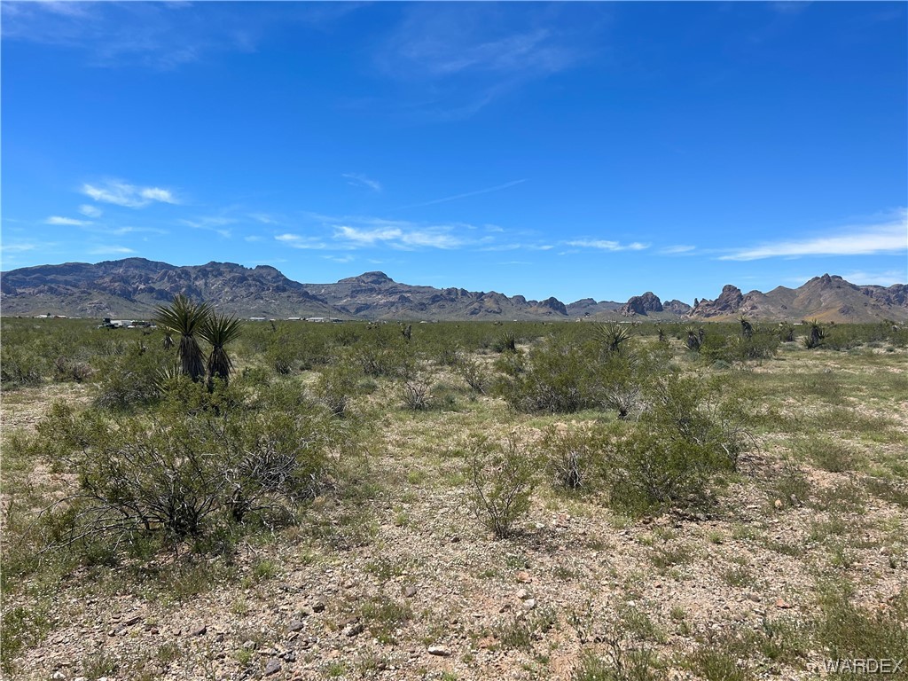 3321 South Alexandrite Road Golden Valley, AZ 86413 - Photo 2 of 7 a view of lake with mountain
