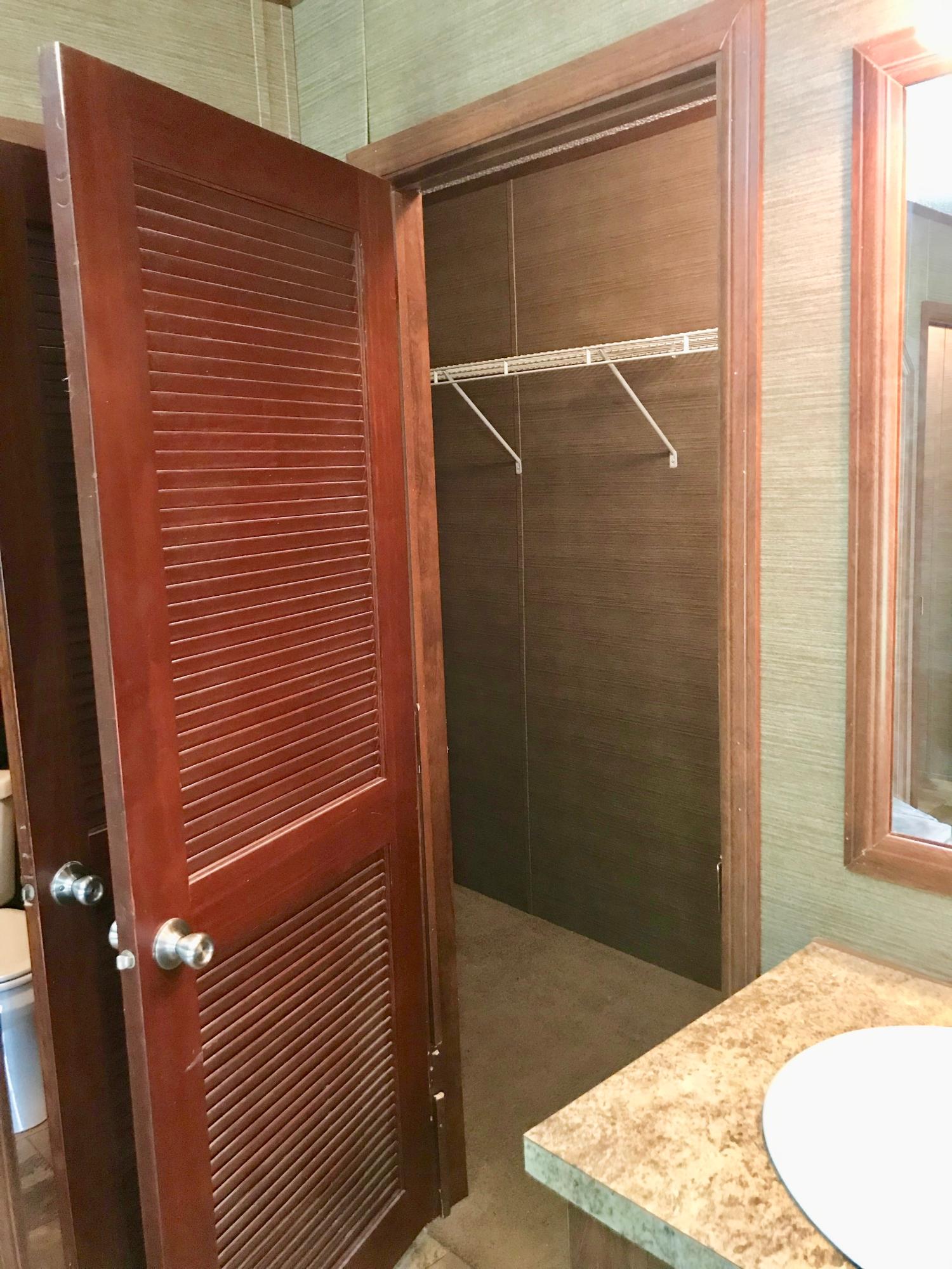 9840 American Farms Road Milton, FL 32583 - Photo 18 of 42 a bathroom with a sink and shower