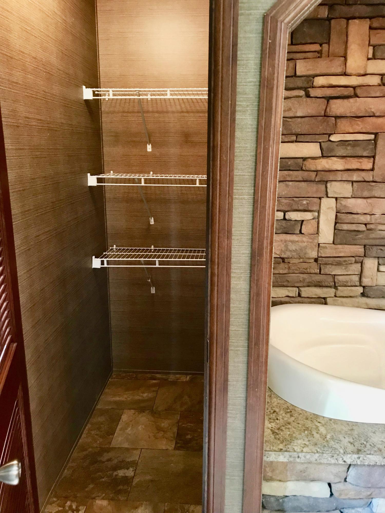 9840 American Farms Road Milton, FL 32583 - Photo 20 of 42 a bathroom with a shower