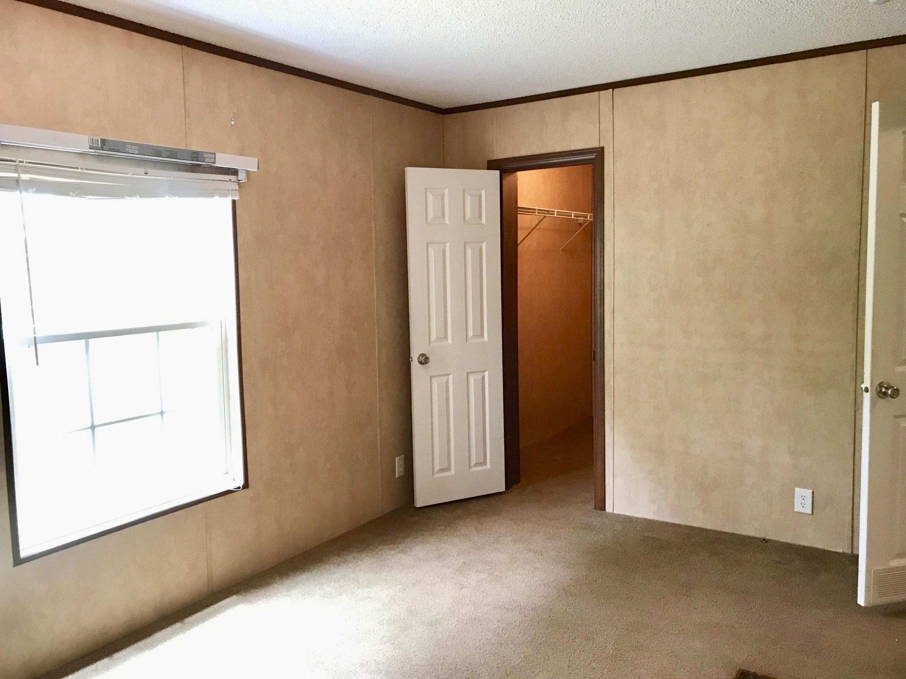 9840 American Farms Road Milton, FL 32583 - Photo 29 of 42 a view of an empty room with a window
