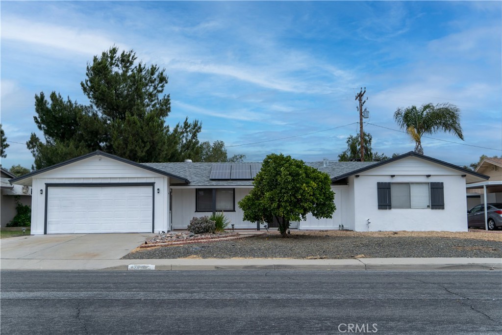26230 Ridgemoor Road Menifee, CA 92586 - Photo 1 of 1 a front view of a house with a yard