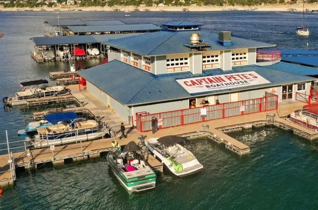 outdoor space with lots of water and view kitchen