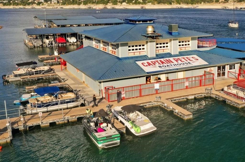 303 Augusta Cove Point Venture, TX 78645 - Photo 4 of 4 outdoor space with lots of water and view kitchen