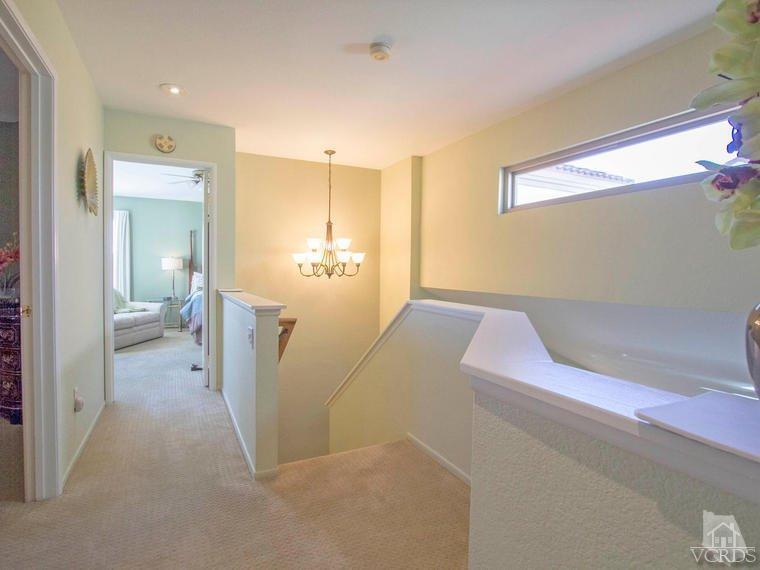 15310 Rains Court Moorpark, CA 93021 - Photo 17 of 29 a en suite bathroom with a granite countertop sink