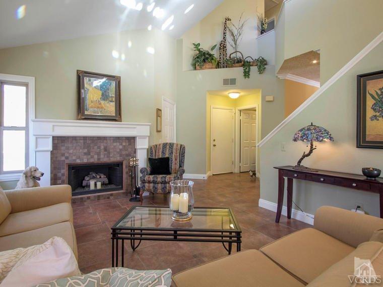 15310 Rains Court Moorpark, CA 93021 - Photo 3 of 29 a living room with furniture and a fireplace