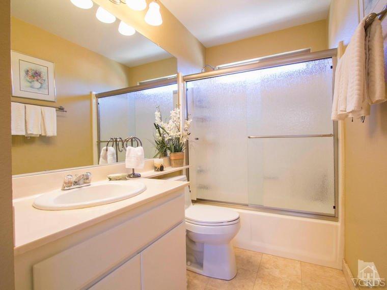 15310 Rains Court Moorpark, CA 93021 - Photo 23 of 29 a bathroom with a sink toilet and shower