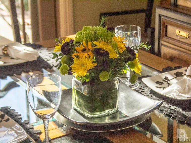 15310 Rains Court Moorpark, CA 93021 - Photo 8 of 29 a vase of flowers sitting on a table