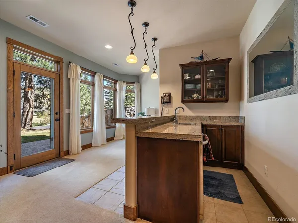 $1,880,000 | 1969 Interlocken Drive, Evergreen, CO 80439