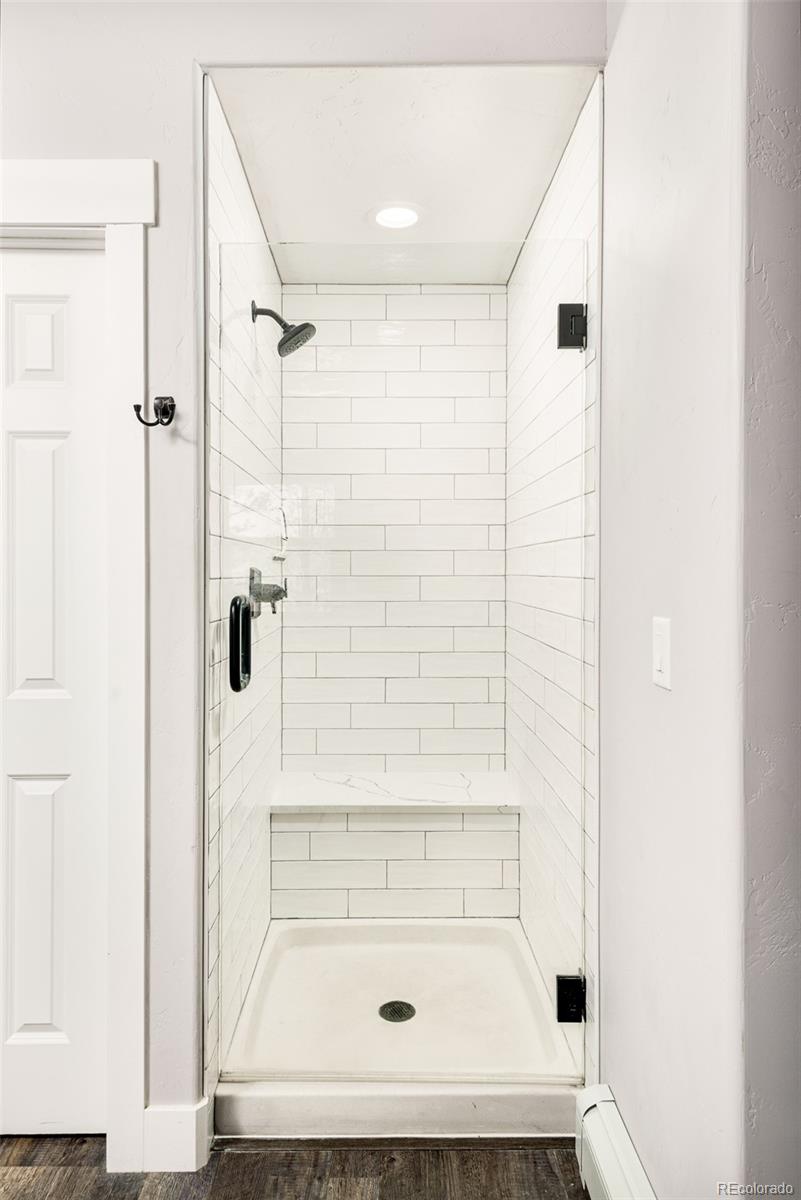 5132 Ute Road Indian Hills, CO 80454 - Photo 26 of 38 a bathroom with a shower