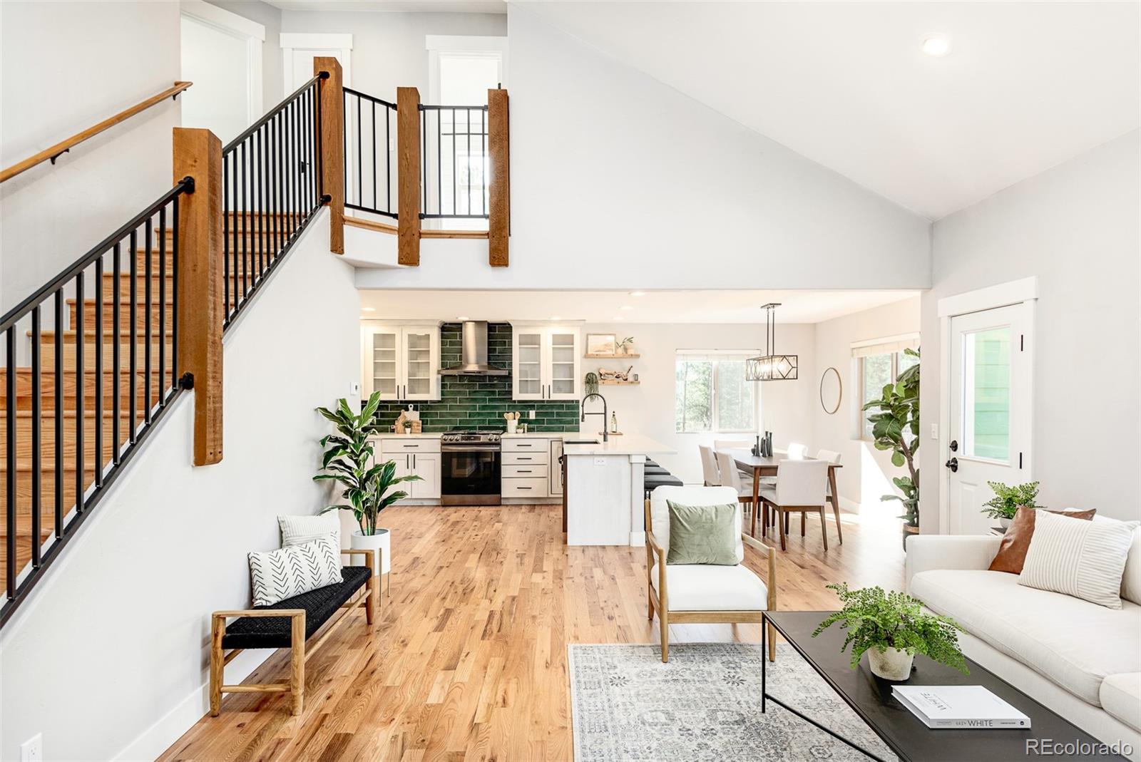 5132 Ute Road Indian Hills, CO 80454 - Photo 6 of 38 a living room with furniture and wooden floor