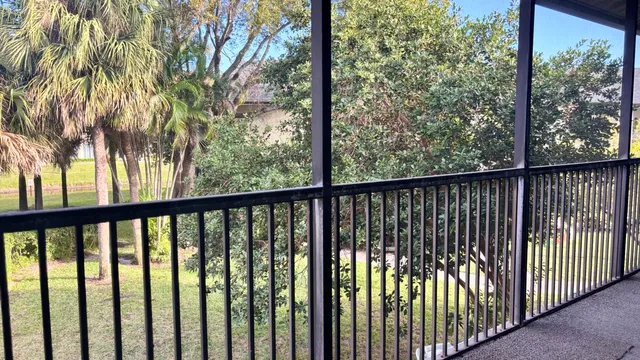 a view of a street from a balcony