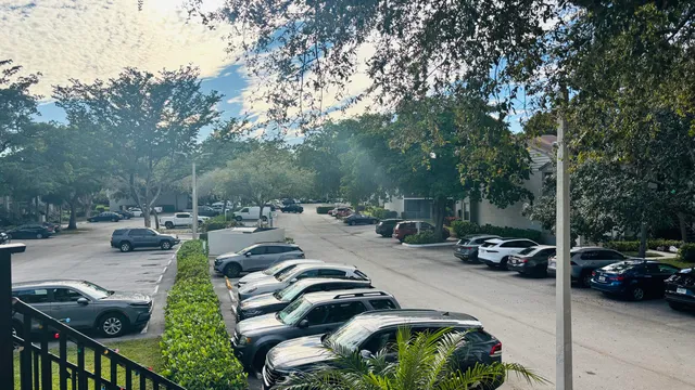 a view of a street with cars