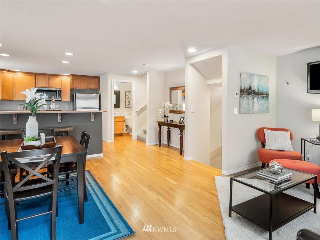 1212 North 85th Street, Unit B Seattle, WA 98103 - Photo 2 of 28 a room with furniture and a wooden floor
