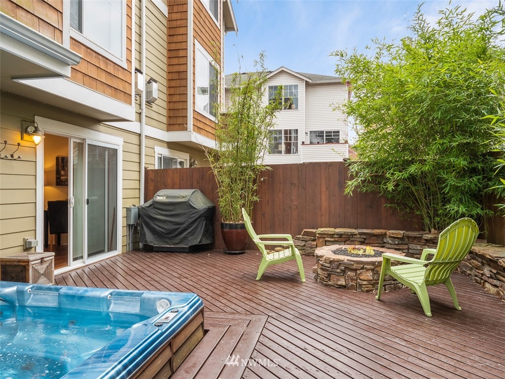 1212 North 85th Street, Unit B Seattle, WA 98103 - Photo 27 of 28 a view of a patio with couple of chairs and a couch