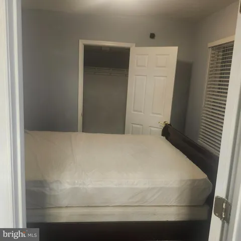 a bedroom with a bed