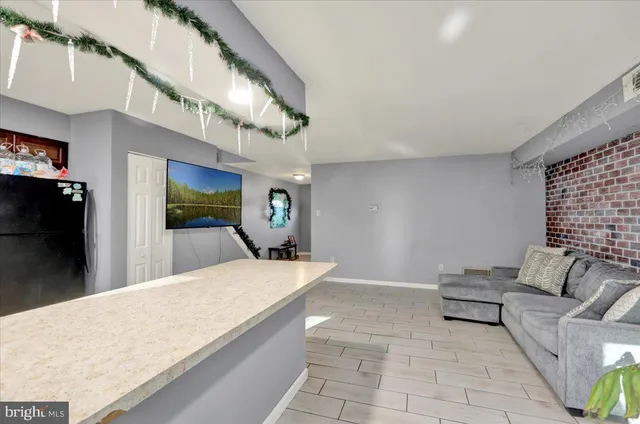 wooden floor in a hall with a window