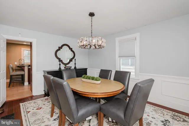 a kitchen with stainless steel appliances granite countertop a sink stove and microwave