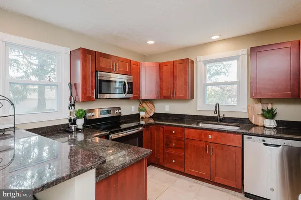 a white toilet sitting next to a shower curtain