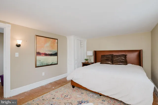 a view of a house with backyard sitting area and tub