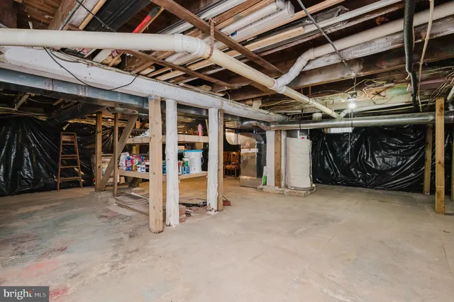 a backyard of a house with lots of trees