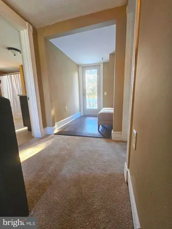 a front view of a building with street view