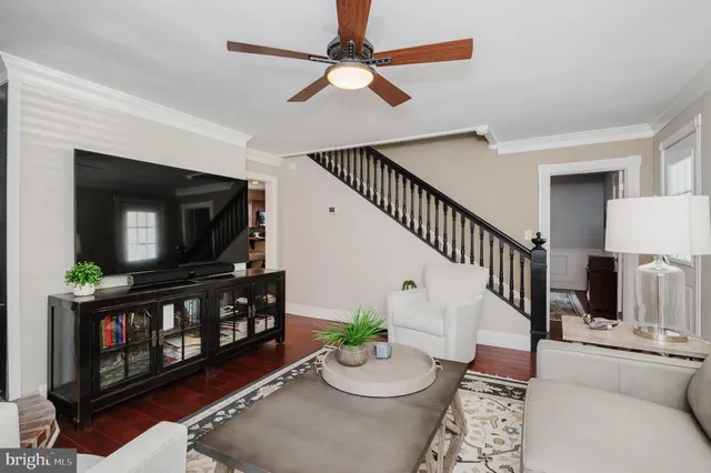 a kitchen with stainless steel appliances granite countertop a stove a sink dishwasher a stove a refrigerator a microwave oven with granite countertops and cabinets