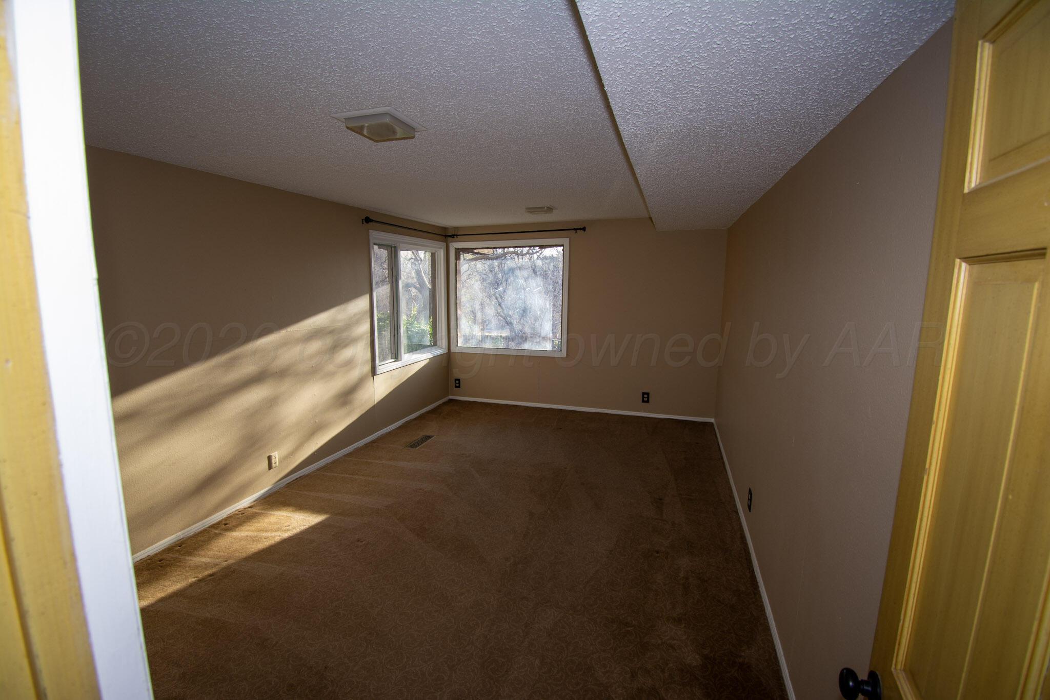 4 Windsor Road Amarillo, TX 79124 - Photo 25 of 41 a view of an empty room and window