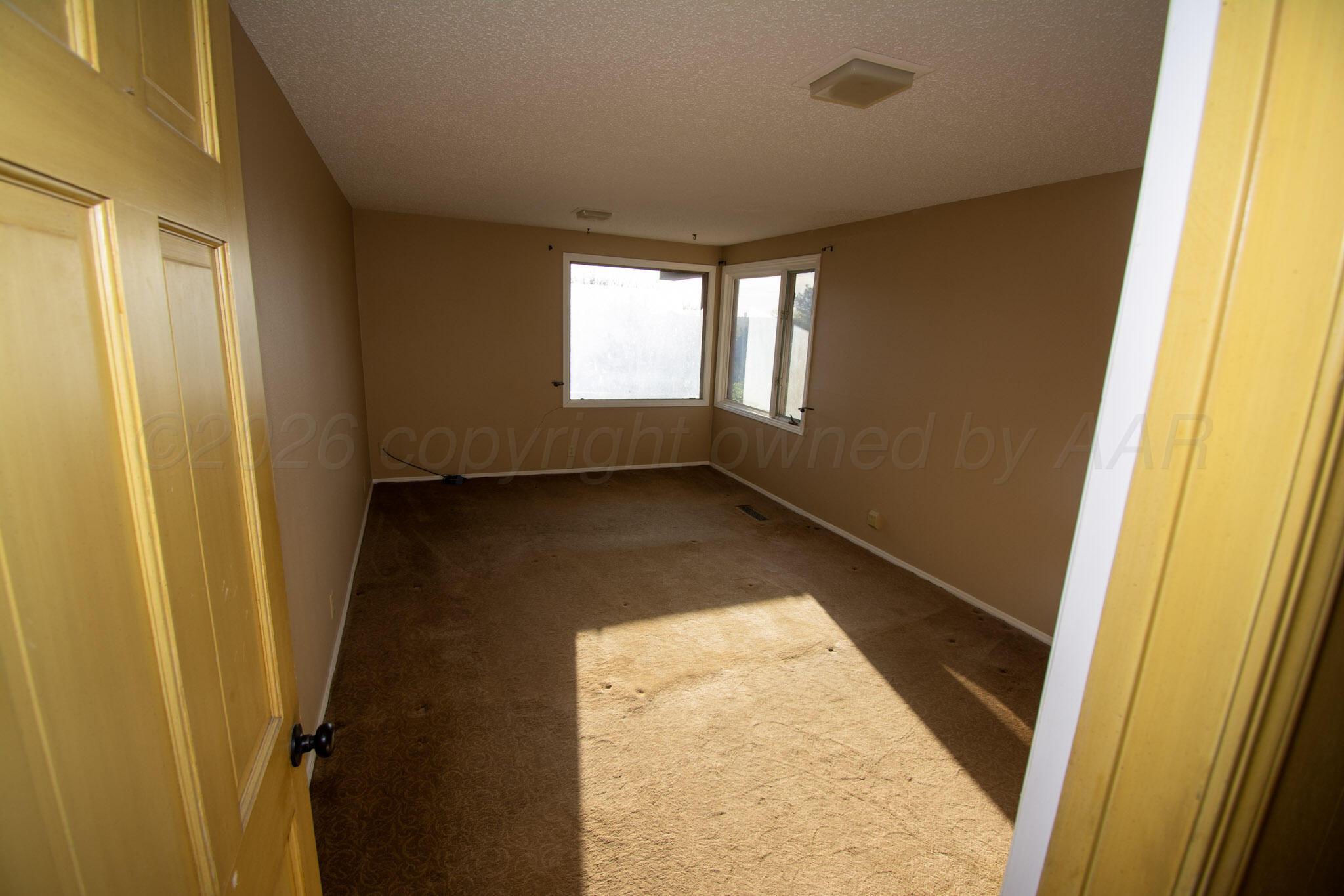 4 Windsor Road Amarillo, TX 79124 - Photo 27 of 41 a view of an empty room and window