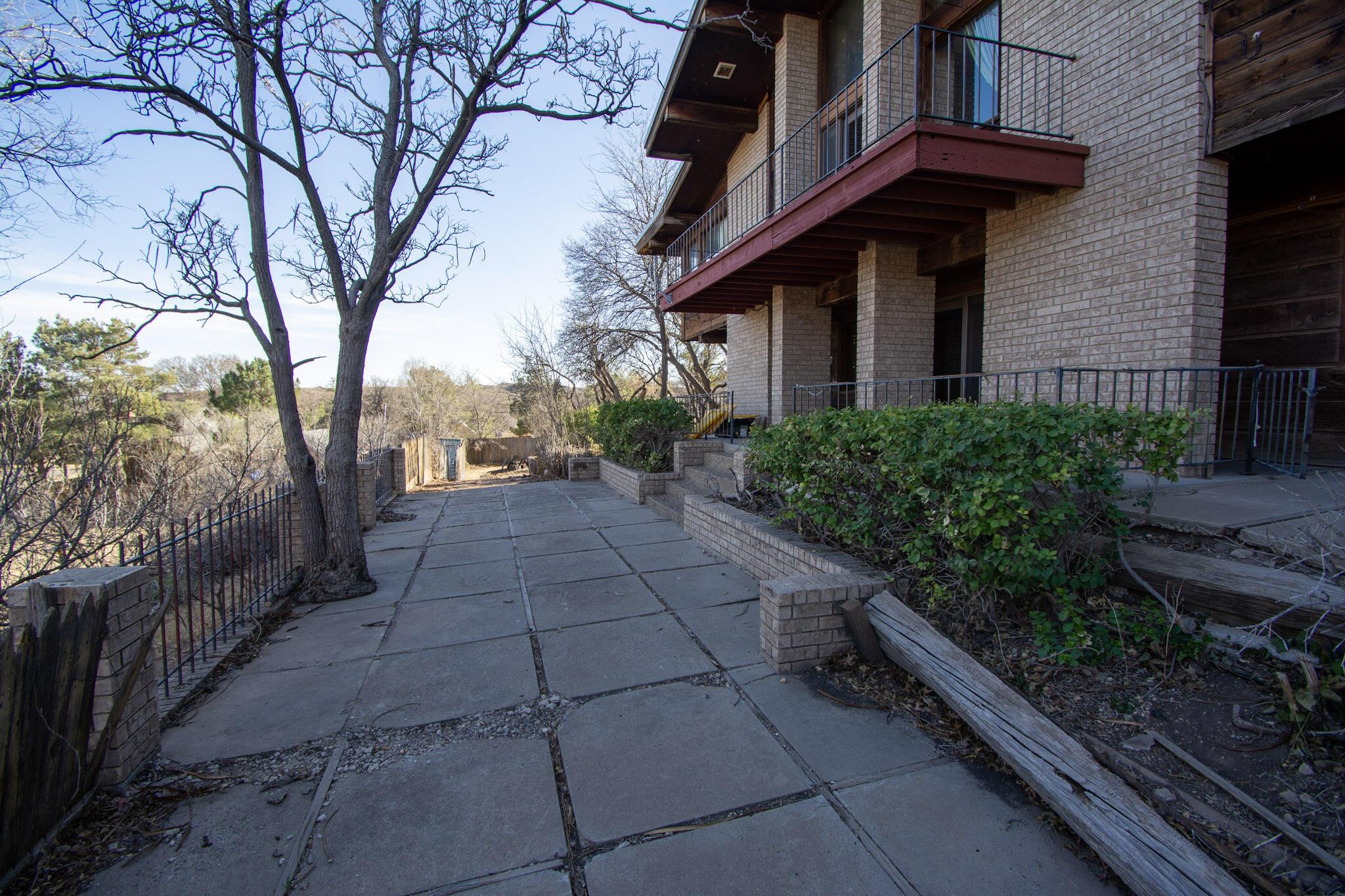 4 Windsor Road Amarillo, TX 79124 - Photo 36 of 41 a view of a pathway with a house