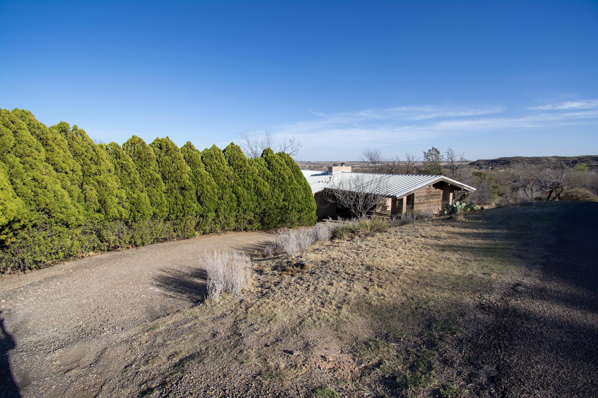 4 Windsor Road Amarillo, TX 79124 - Photo 39 of 41 a view of a lake with a yard