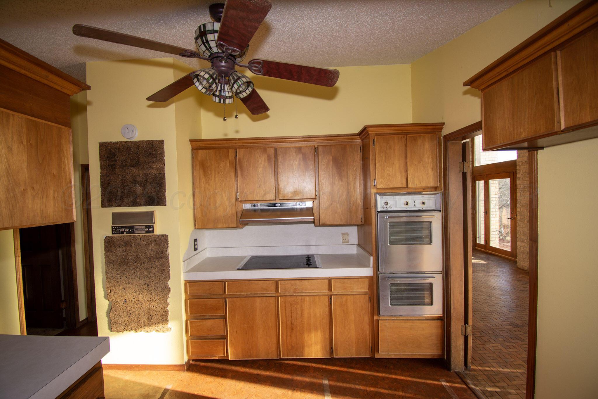 4 Windsor Road Amarillo, TX 79124 - Photo 9 of 41 a kitchen with stainless steel appliances granite countertop a refrigerator and a sink