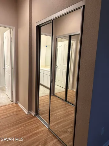 a view of a bathroom from a hallway