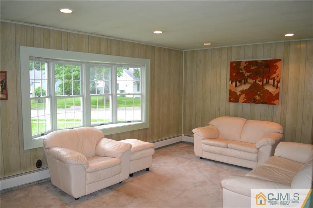 2 Dayton Road Edison, NJ 08817 - Photo 2 of 15 a living room with furniture and a large window
