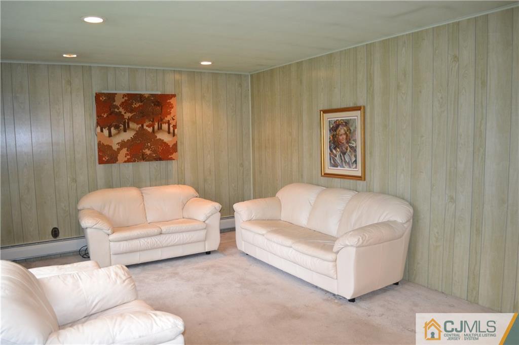 2 Dayton Road Edison, NJ 08817 - Photo 3 of 15 a living room with furniture and a white wall