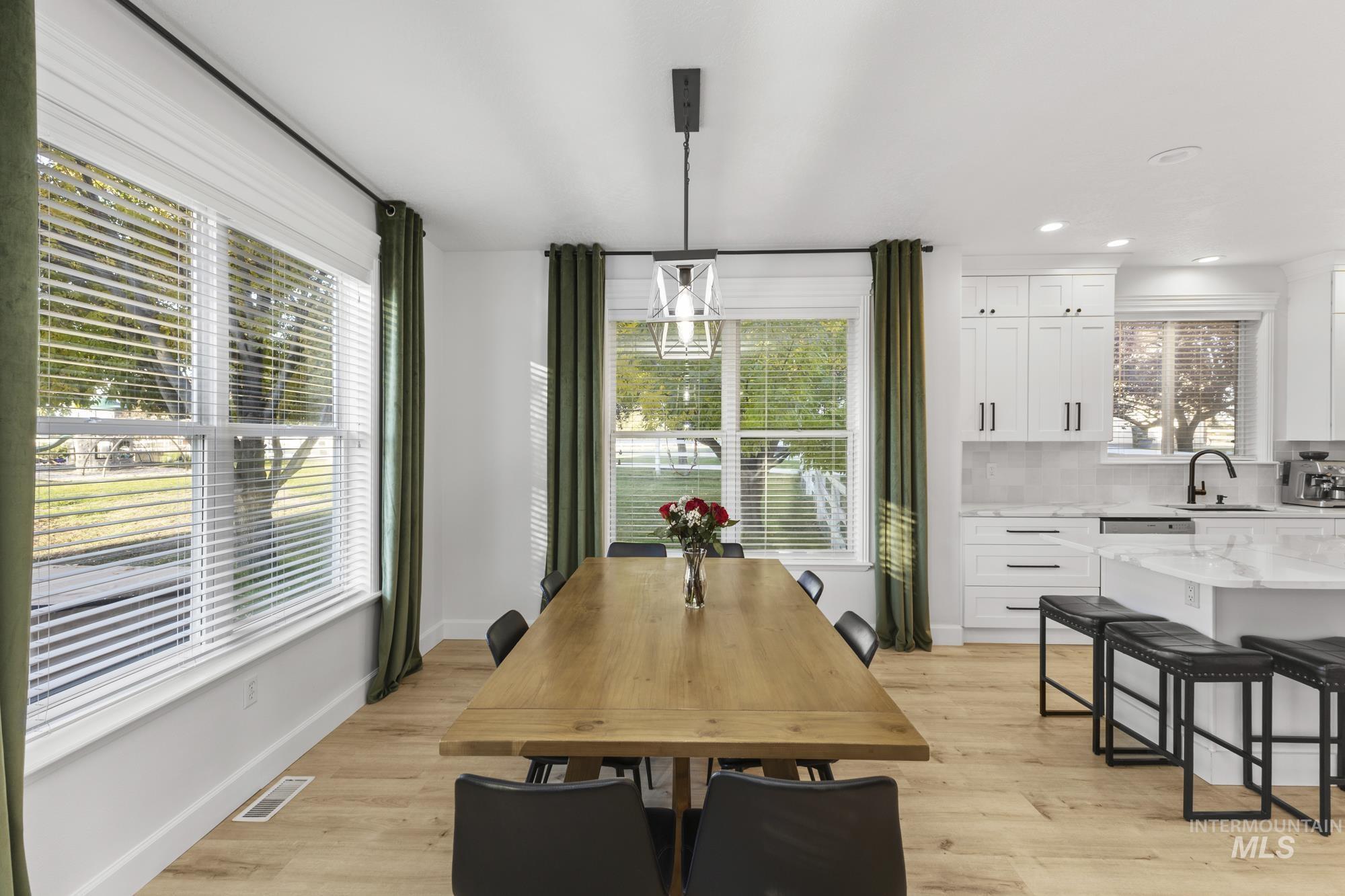 14820 Worden Way Caldwell, ID 83607 - Photo 17 of 44 Dining space with light wood-style floors and recessed lighting