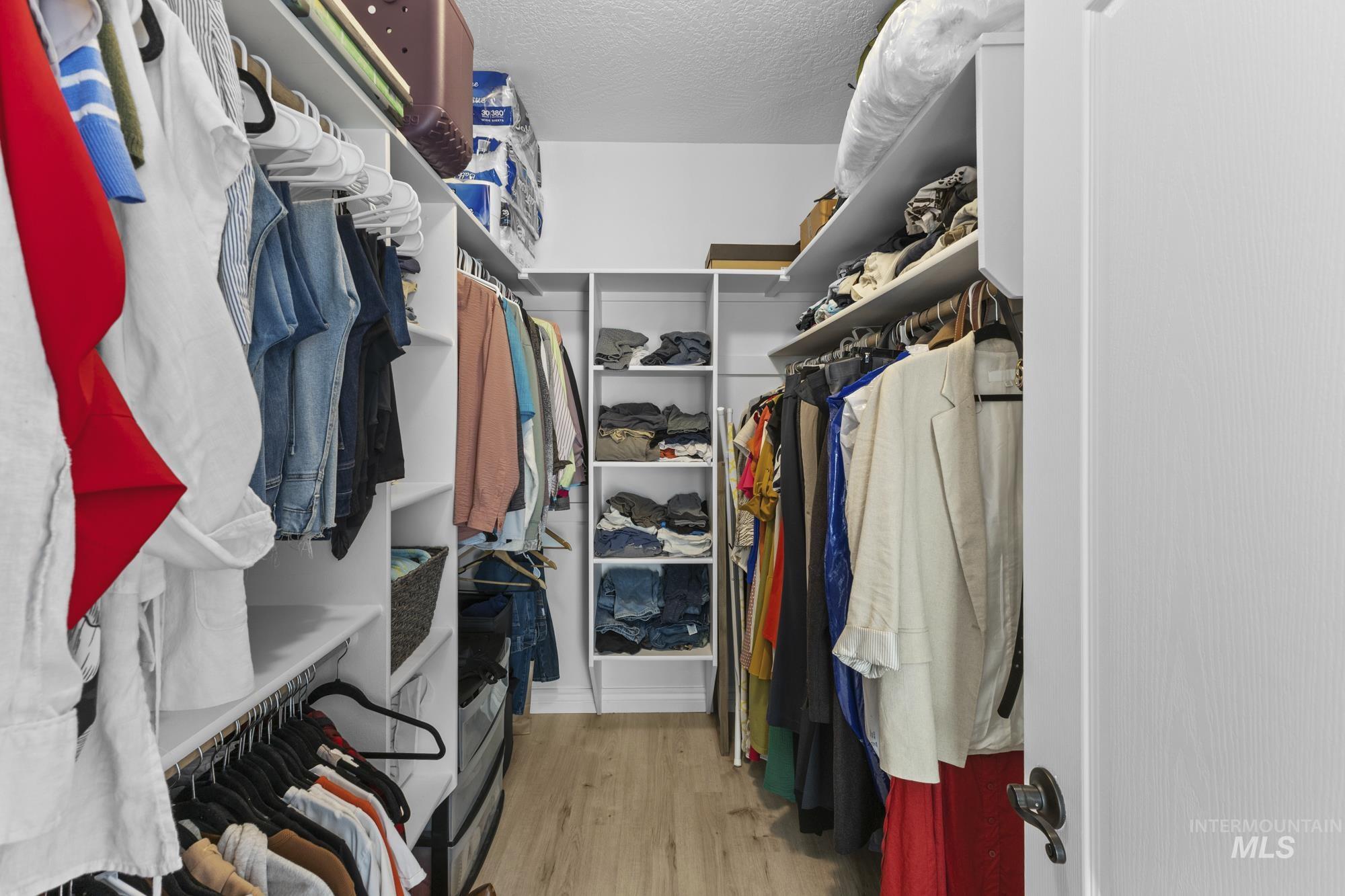 14820 Worden Way Caldwell, ID 83607 - Photo 30 of 44 Walk in closet featuring light wood-style flooring