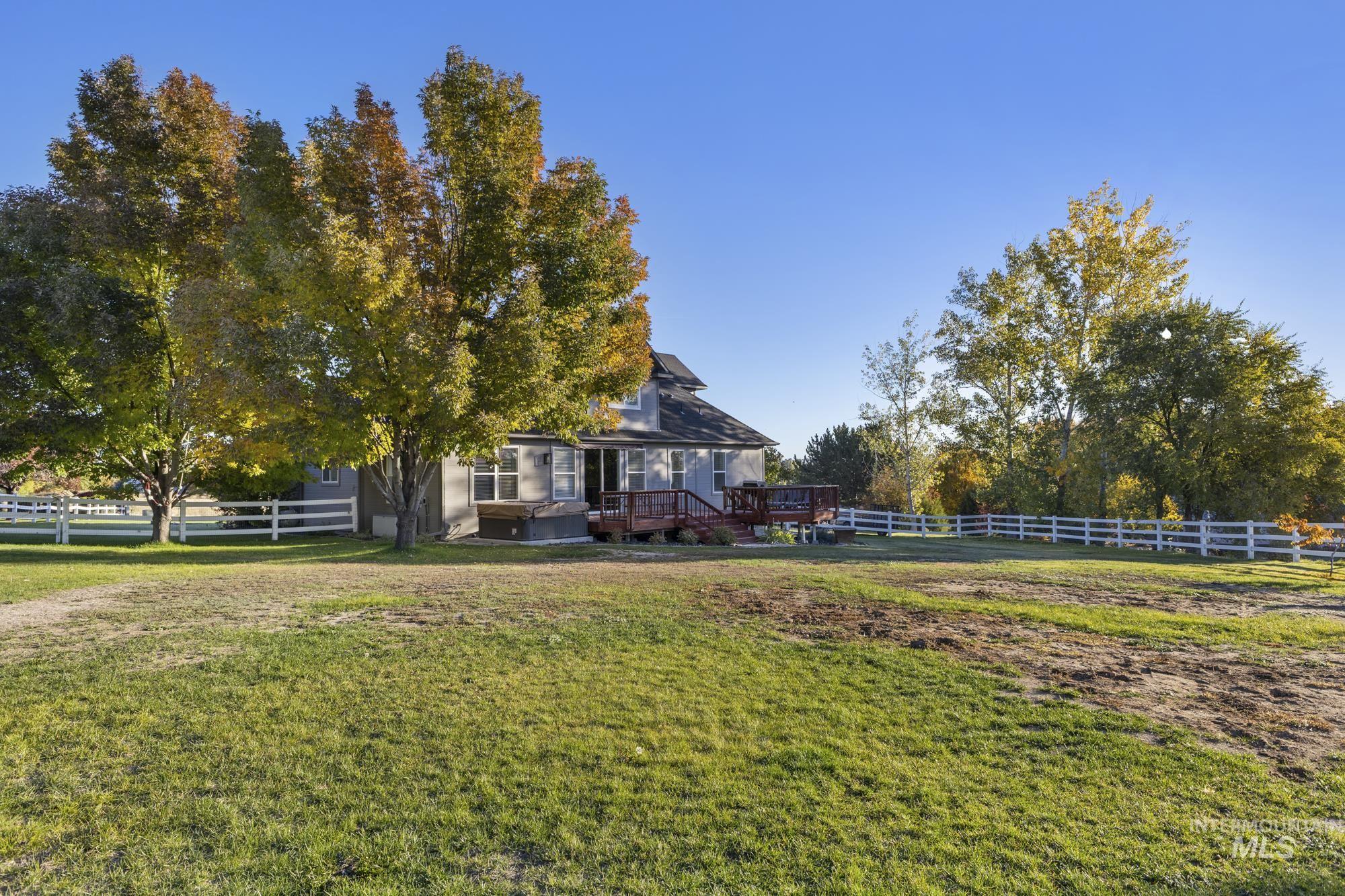 14820 Worden Way Caldwell, ID 83607 - Photo 41 of 44 Fenced backyard featuring a wooden deck
