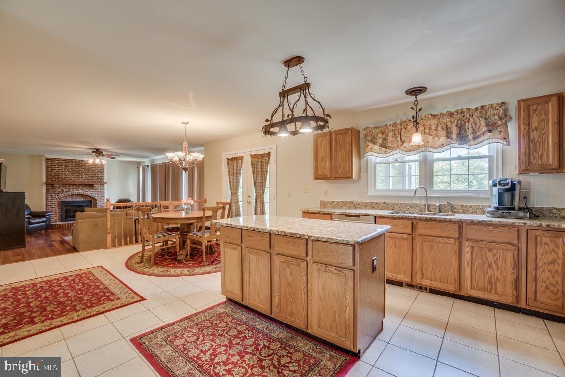 6113 Fox Point Road Fredericksburg, VA 22407 - Photo 10 of 47 Open kitchen has granite countertops